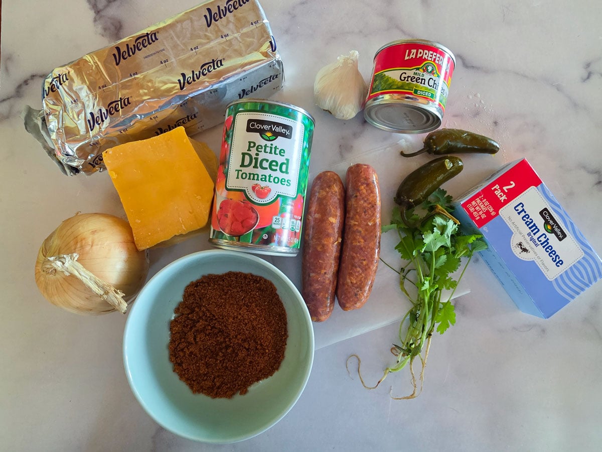 Ingredients for queso dip. See the list in the recipe card below.