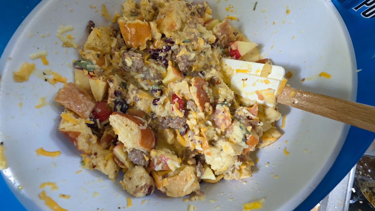 Casserole ingredients mixed up in a bowl.